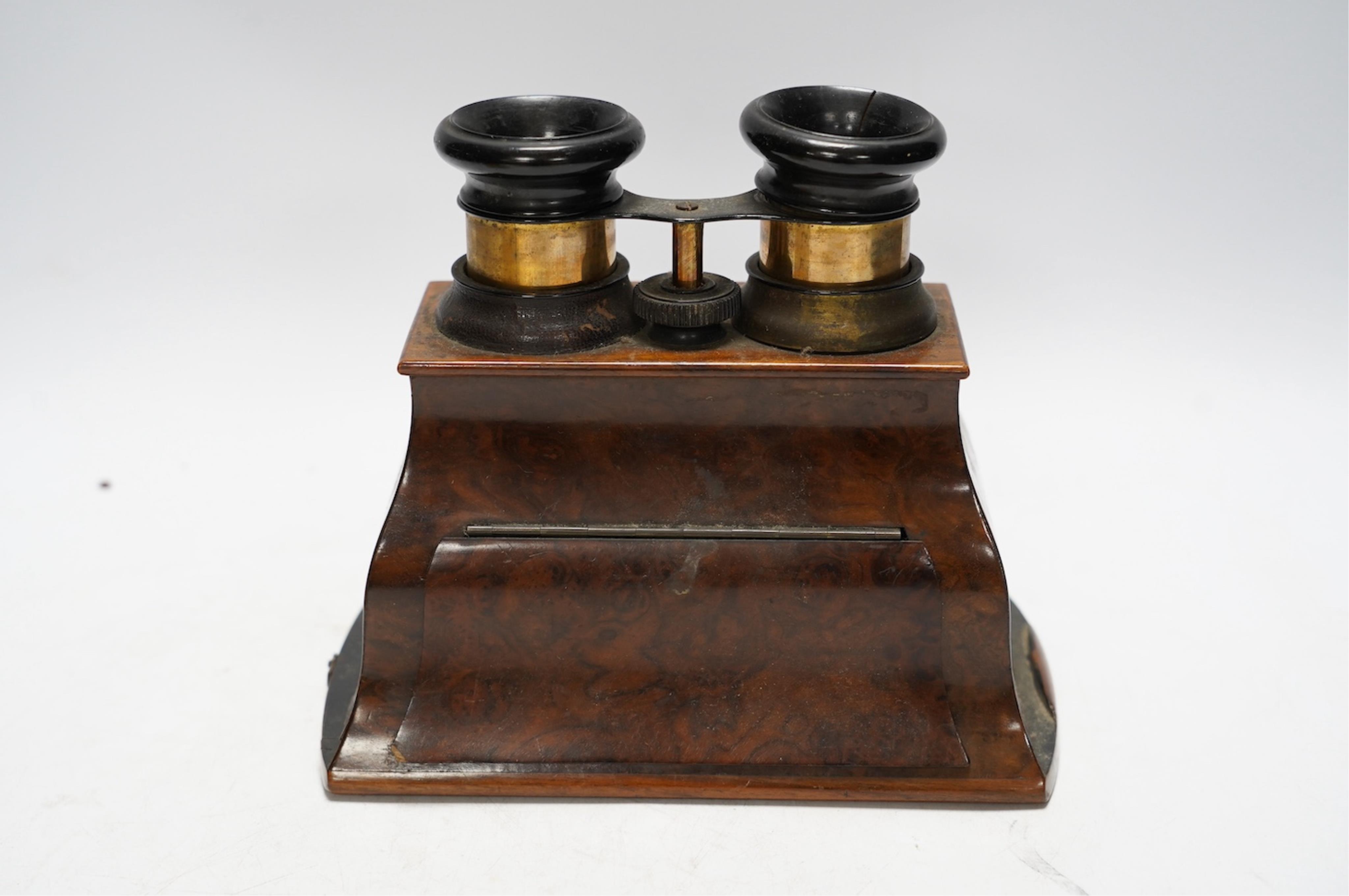 A late 19th century cased stereoscopic viewer together with topographical and other cards. Condition - fair